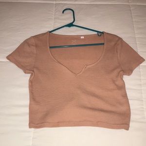Cropped tee with low cut neck
